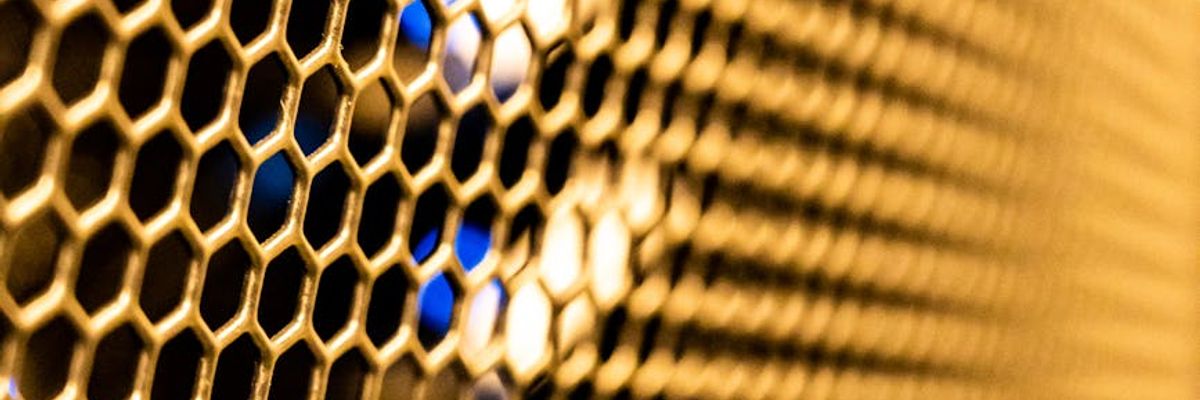 Wide neon grid background with light trails